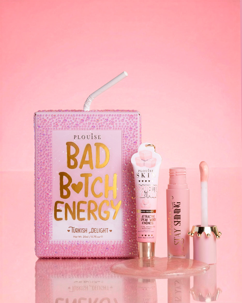 Duo di labbra rosa P.Louise Crystal Glitter Bad Bitch Energy in sorbetto arcobaleno, caratterizzato da un olio per labbra lucido e un balsamo per labbra