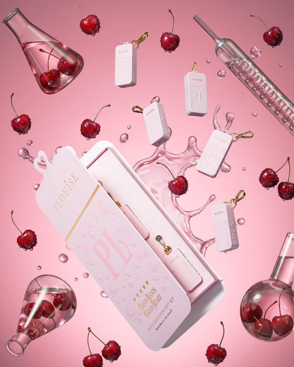 Giant pink PR box gift set containing 5 pink P.Louise hand sanitiser sprays in various cherry scents