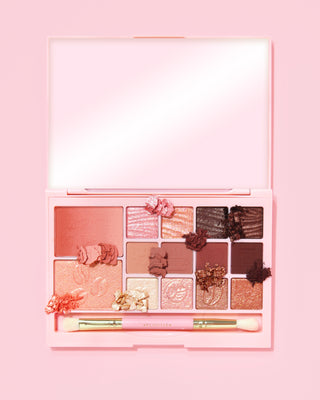 An image of the P. Louise Breakfast Bites All In One Makeup Palette in Hot To Go in a neutral & mauve colour way  on a pink background