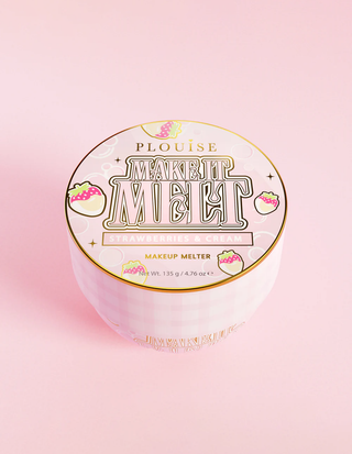 A container of P.Louise Make It Melt Makeup Cleansing Balmr with a pink label and gold accents on a pink background