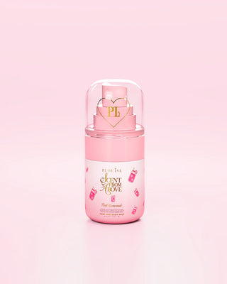 Pink mini bottle of P.Louise Scent From Above body mist in pink lemonade