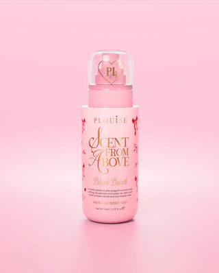 Flacone rosa di spray per capelli e corpo P.Louise 'Scent From Above' nella fragranza blush da spiaggia