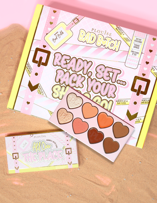 P.Louise All Over The Place Face Palette emballasje og produkt vist med hjerteformede pannenyanser i forskjellige farger på en sandbunn.